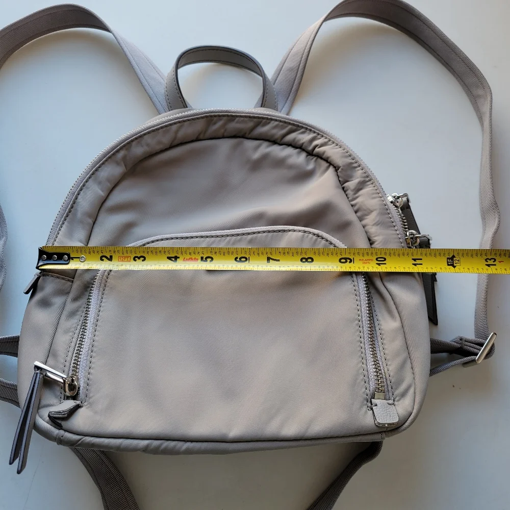 Kate Spade Dawn medium size backpack in light gray